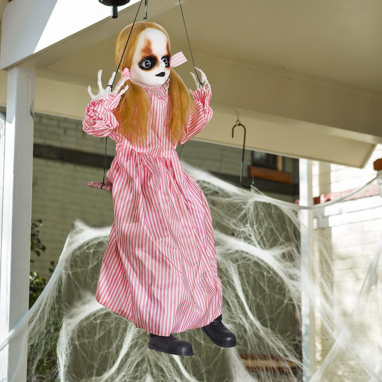 Treewoll Halloween Hanging Ghost Props, 2.6FT H Life-Sized Voice-Activated Pink Skirt Girl Sitting on Swing with Lighted Eyes & Kicking Legs & Eerie Sound for Haunted House Trees Spooky Party Decor